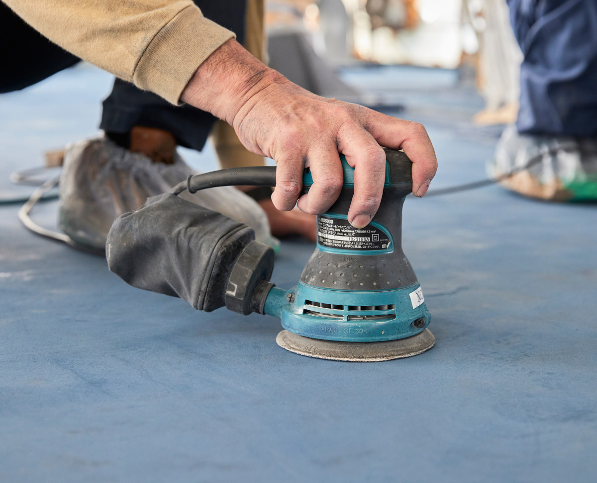 下地処理工程でのシンコーの現場作業員